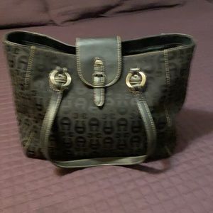 The name reads Etienne Aigner but don’t believe to be real. Great condition!